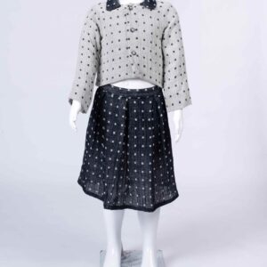 grey dotted top and skirt