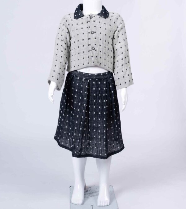 grey dotted top and skirt