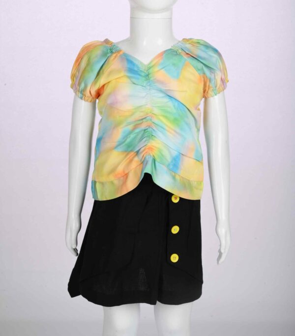 tie dye smoked top and black skirt