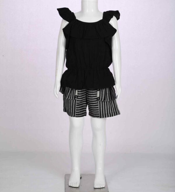 black sleeveless top and grey striped shorts