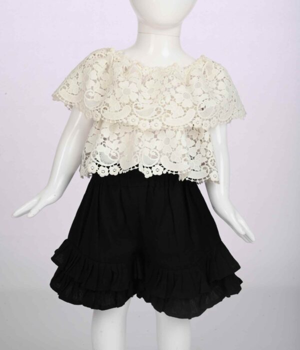 white lace top and black shorts