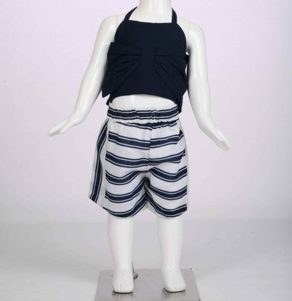 navy blue top with striped shorts