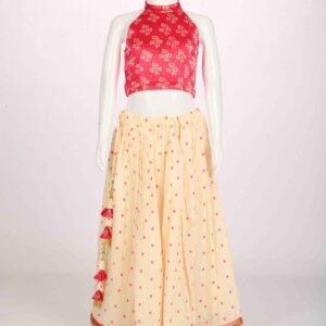 off white lehenga with pink halter blouse